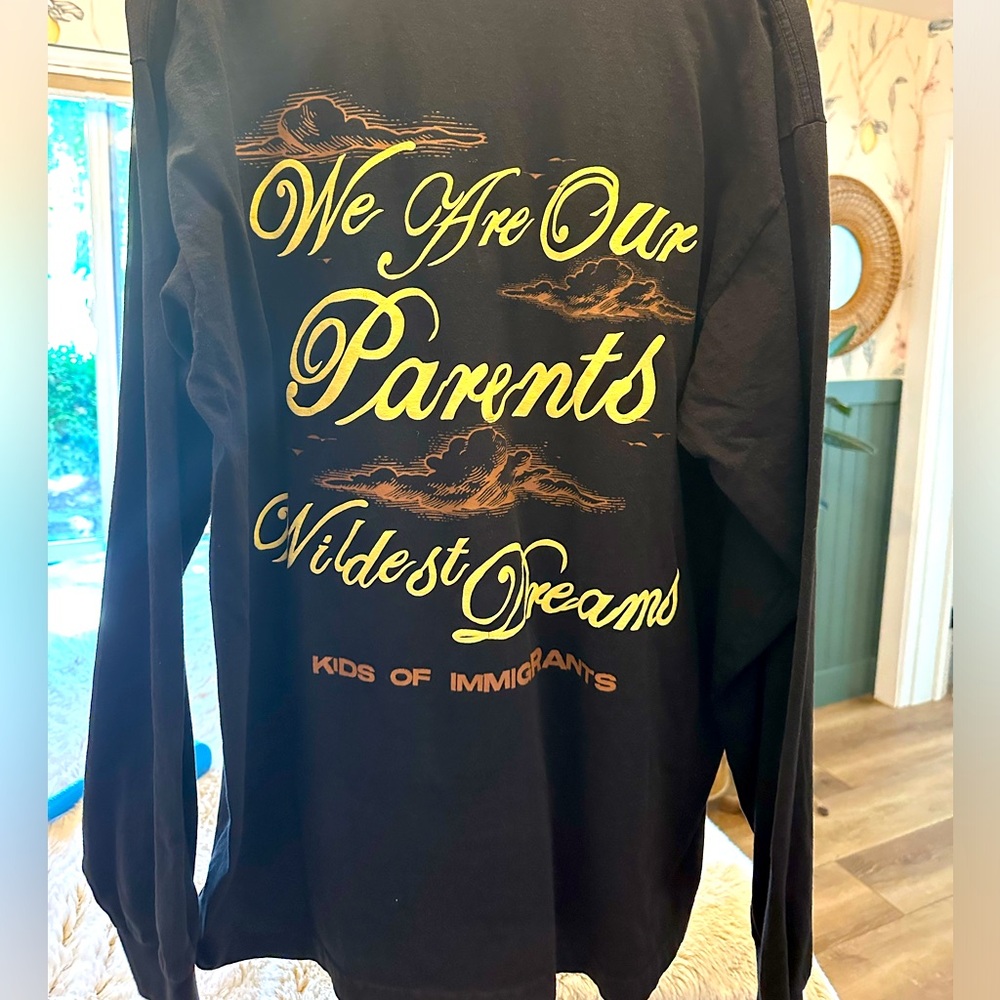 Kids Of Immigrants long sleeve t-shirt. 100% cotton and fits true to size.